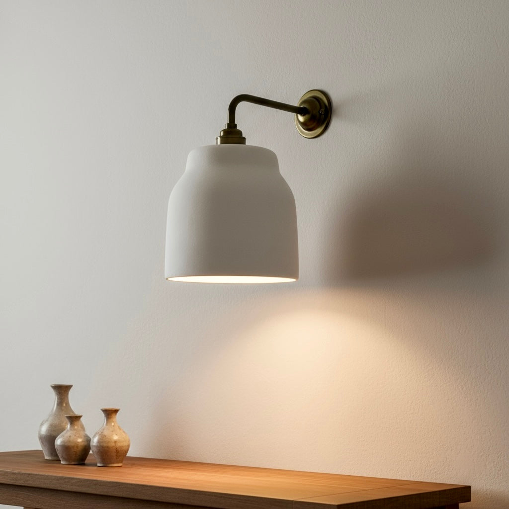HECATO handcrafted plaster wall sconce with brass arm