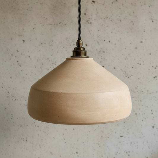 Handmade pendant light against a textured wall