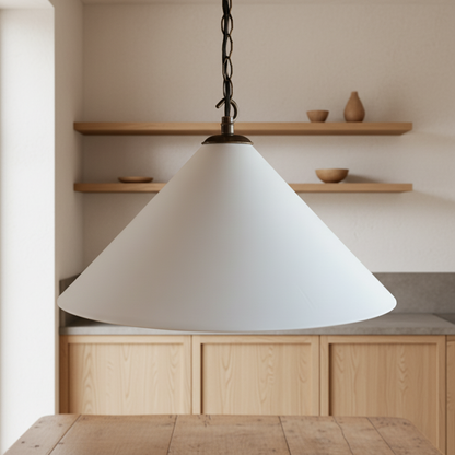 Plaster cone pendant light hanging in a kitchen with wooden shelves and cabinets.