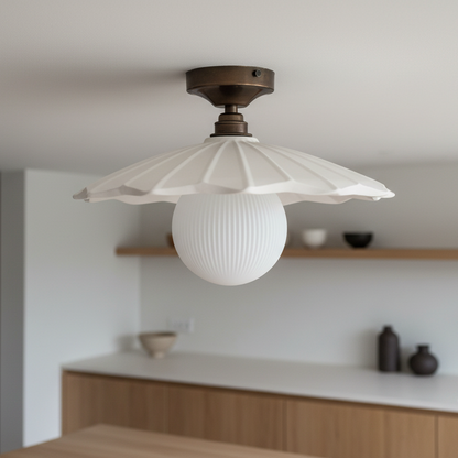 Flush mount ceiling light fixture in a kitchen setting with neutral tones