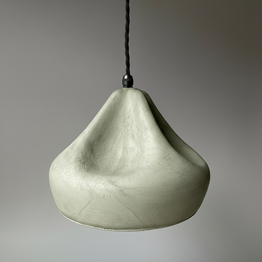 Green plaster pendant light on a gray background