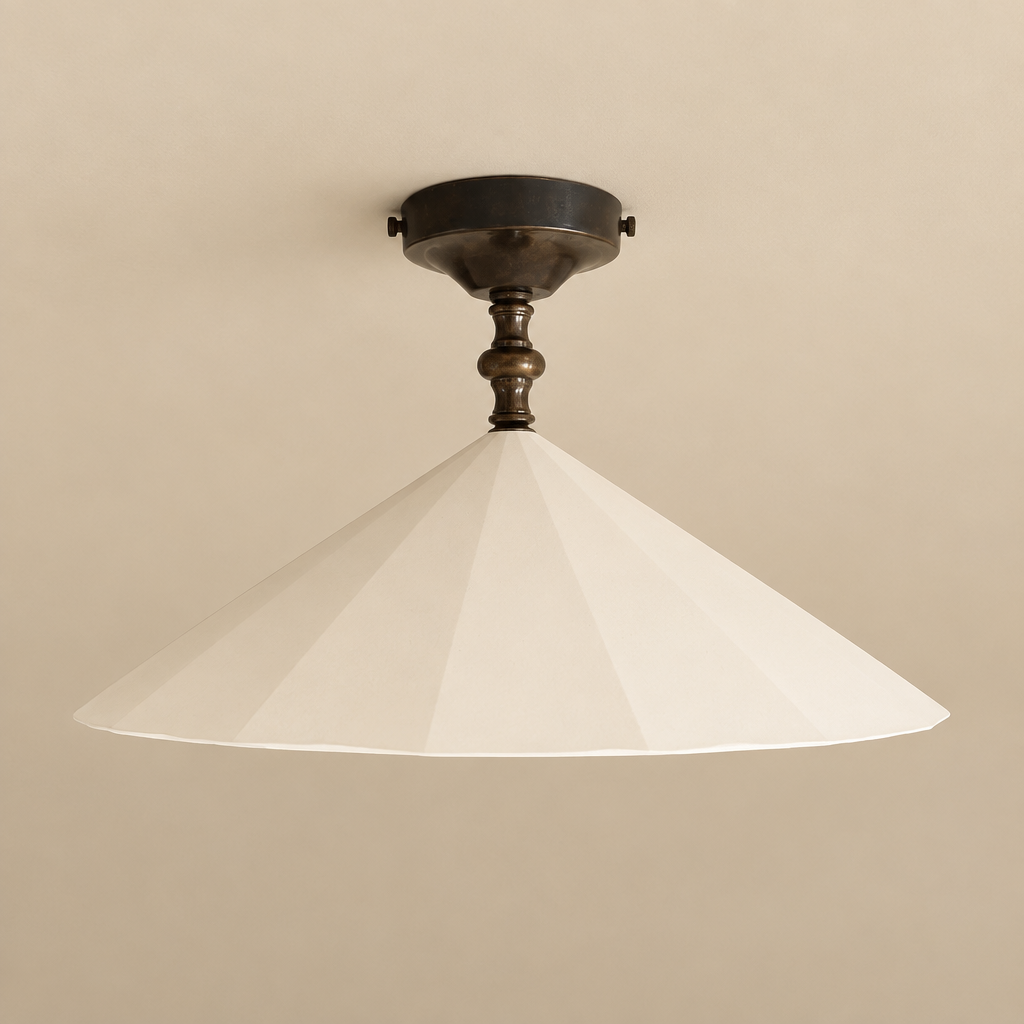 Square image of the flush mount light on a beige ceiling