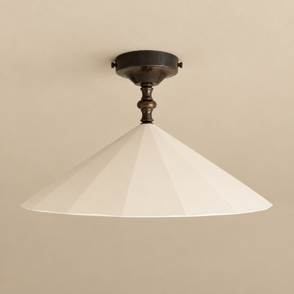 Square image of the flush mount light on a beige ceiling